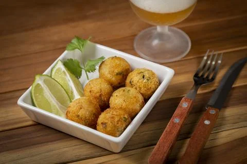 Cod dumpling. Traditional brasilian snack. Bunuelos de bacalo. Stock Photos