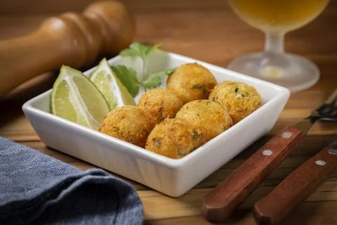 Cod dumpling. Traditional brasilian snack. Bunuelos de bacalo. Stock Photos