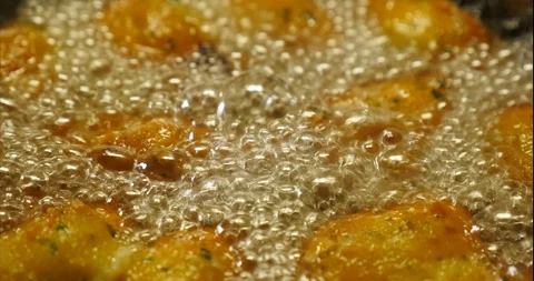 Cod dumplings - bolinhos de bacalhau - Fried ball of cod -Portuguese Food Stock Footage 127637829