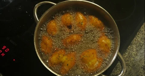 Cod dumplings - bolinhos de bacalhau - Fried ball of cod -Portuguese Food Stock Footage 127637833