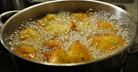 Cod dumplings - bolinhos de bacalhau - Fried ball of cod -Portuguese Food Stock Footage 127637834