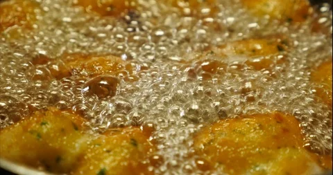 Cod dumplings - bolinhos de bacalhau - Fried ball of cod -Portuguese Food Stock Footage 127637866
