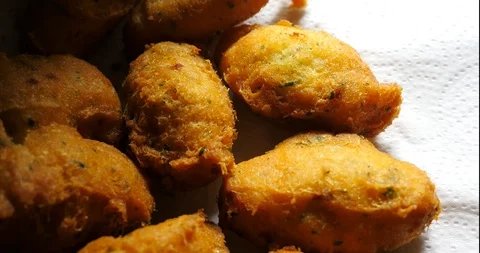 Cod dumplings - bolinhos de bacalhau - Fried ball of cod -Portuguese Food Stock Footage 127637980