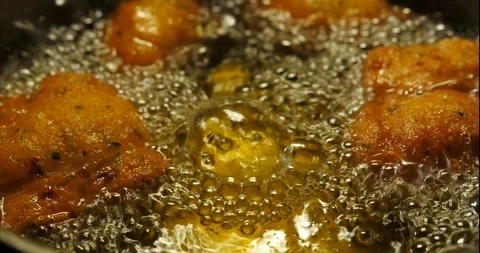 Cod dumplings - bolinhos de bacalhau - Fried ball of cod -Portuguese Food Stock Footage 127637982