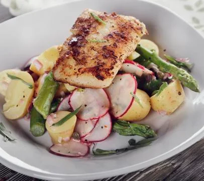 Cod Fillet and Vegetables Stock Photos