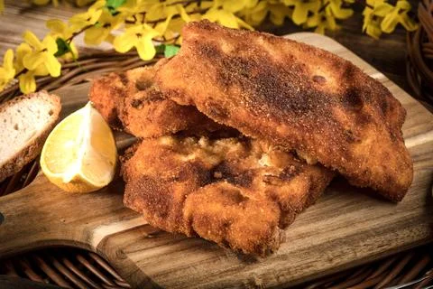 Cod fillet fried in breadcrumbs. Stock Photos