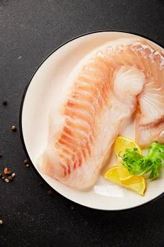 Cod fillet, raw fish seafood tasty snack fresh pescetarian diet gourmet foo.. Stock Photos