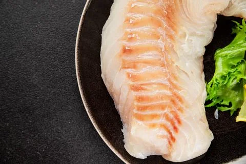 Cod fillet, raw fish seafood tasty snack fresh pescetarian diet gourmet foo.. Stock Photos