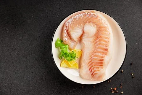 Cod fillet, raw fish seafood tasty snack fresh pescetarian diet gourmet foo.. Stock Photos