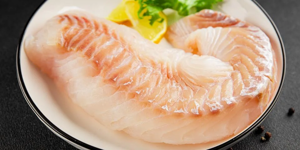 Cod fillet, raw fish seafood tasty snack fresh pescetarian diet gourmet foo.. Stock Photos