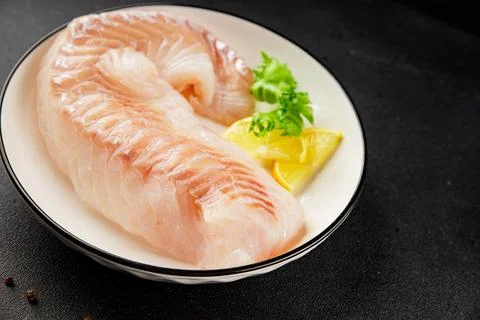 Cod fillet, raw fish seafood tasty snack fresh pescetarian diet gourmet foo.. Stock Photos