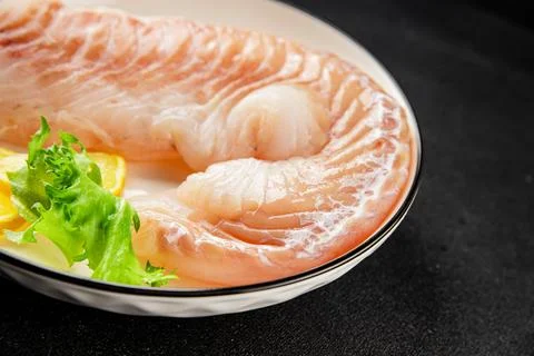 Cod fillet, raw fish seafood tasty snack fresh pescetarian diet gourmet foo.. Stock Photos