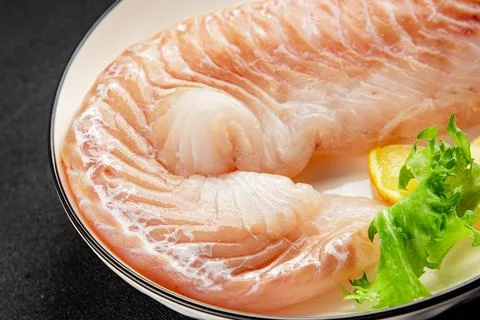 Cod fillet, raw fish seafood tasty snack fresh pescetarian diet gourmet foo.. Stock Photos