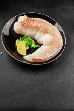 Cod fillet, raw fish seafood tasty snack fresh pescetarian diet gourmet foo.. Stock Photos