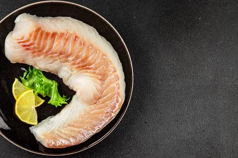 Cod fillet, raw fish seafood tasty snack fresh pescetarian diet gourmet foo.. Stock Photos