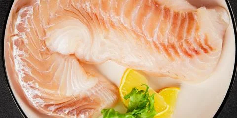 Cod fillet, raw fish seafood tasty snack fresh pescetarian diet gourmet foo.. Stock Photos