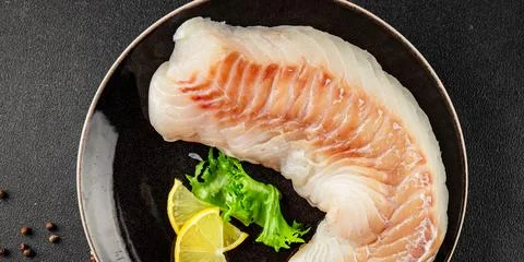 Cod fillet, raw fish seafood tasty snack fresh pescetarian diet gourmet foo.. Stock Photos