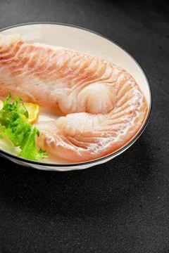 Cod fillet, raw fish seafood tasty snack fresh pescetarian diet gourmet foo.. Stock Photos