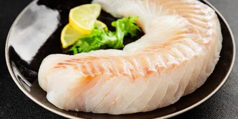 Cod fillet, raw fish seafood tasty snack fresh pescetarian diet gourmet foo.. Stock Photos