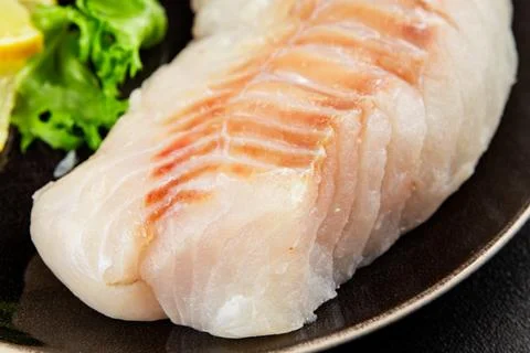 Cod fillet, raw fish seafood tasty snack fresh pescetarian diet gourmet foo.. Stock Photos