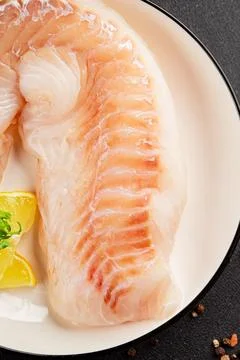 Cod fillet, raw fish seafood tasty snack fresh pescetarian diet gourmet foo.. Stock Photos