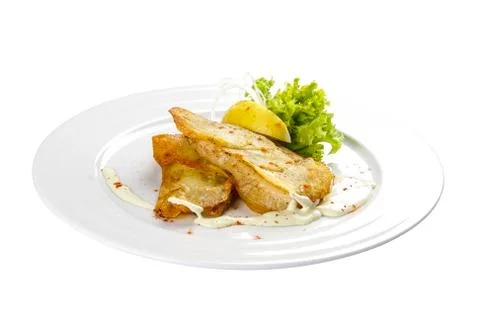 Cod fillets with lemon and salad Stock Photos