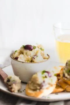 Cod fish brandade on a white ceramic and rustic napkin Foto stock