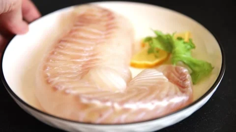 Cod fish fillet, raw fish seafood tasty snack fresh pescetarian diet 스톡 동영상 331299553