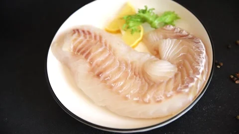 Cod fish fillet, raw fish seafood tasty snack fresh pescetarian diet 스톡 동영상 331299554