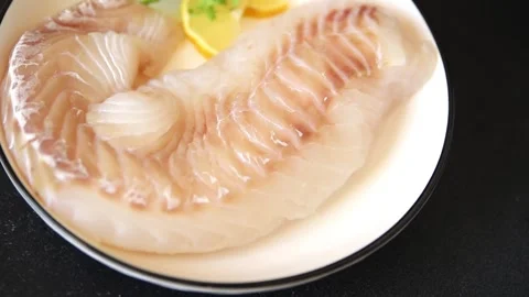 Cod fish fillet, raw fish seafood tasty snack fresh pescetarian diet 스톡 동영상 331299555