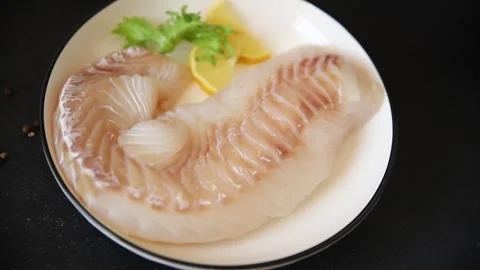 Cod fish fillet, raw fish seafood tasty snack fresh pescetarian diet 스톡 동영상 331299556