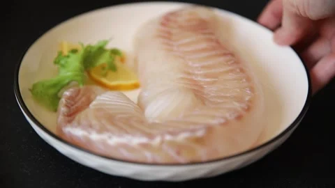 Cod fish fillet, raw fish seafood tasty snack fresh pescetarian diet 스톡 동영상 331299557