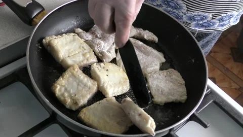 Cod fish is fried in a pan. healthy food concept Stock Footage 154445634
