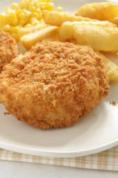 Cod fishcake and chips Foto stock