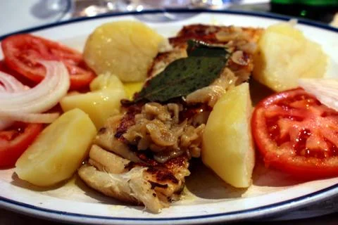 Cod with garlic Stock Photos