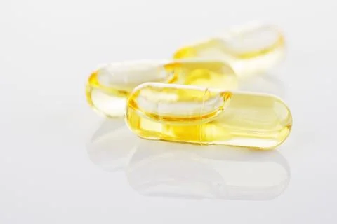 Cod-liver oil capsules Stock Photos