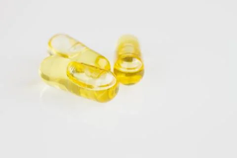 Cod-liver oil capsules Stock Photos