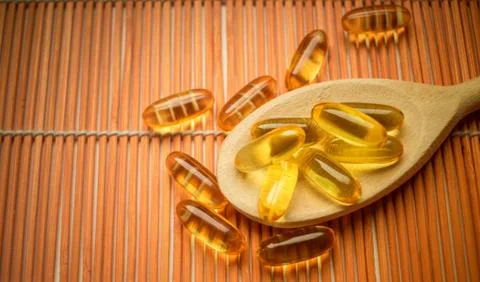 Cod liver oil omega capsules Stock Photos