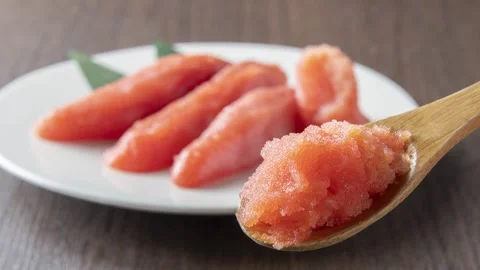 Cod roe tarako with wooden spoon revealing texture, zoom pan 動画素材 337670935