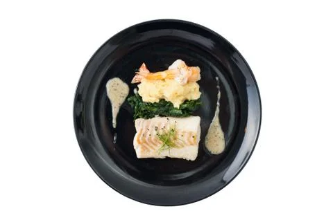 Cod steak with shrimp Stock Photos