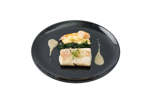 Cod steak with shrimp Stock Photos