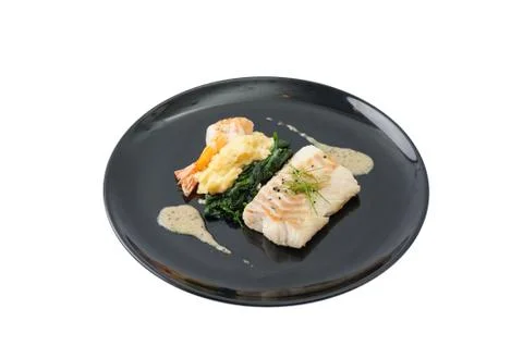 Cod steak with shrimp Stock Photos