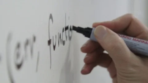Code being written on a whiteboard in black Stock Footage 72265502