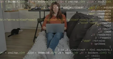 Code computer language, caucasian woman lying on couch and working on laptop Stockbeeldmateriaal 259305929
