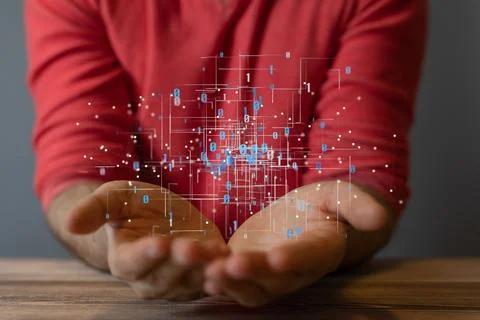 Code concept of 3D rendered connected data hovering over the person's hand Stock Photos