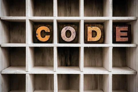  Code Concept Wooden Letterpress Type in Draw The word CODE written in vin... Stock Photos