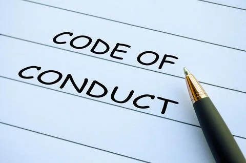 CODE OF CONDUCT, Code of conduct words written on lined paper representing .. Photos