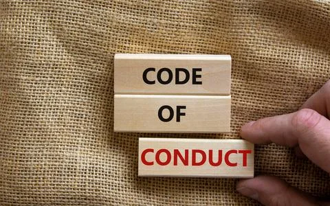 Code of conduct symbol. Concept words 'Code of conduct' on wooden blocks on a Stock Photos