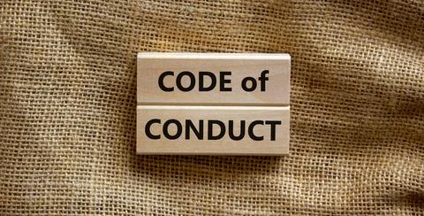 Code of conduct symbol. Concept words 'Code of conduct' on wooden blocks on a Stock Photos