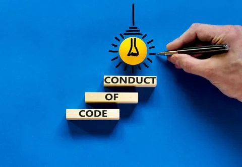 Code of conduct symbol. Concept words 'Code of conduct' on wooden blocks on a Stock Photos